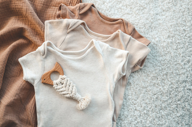 Photo of 3 bodysuits in beige colors