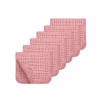 Set of six pink textured cloths on a white background