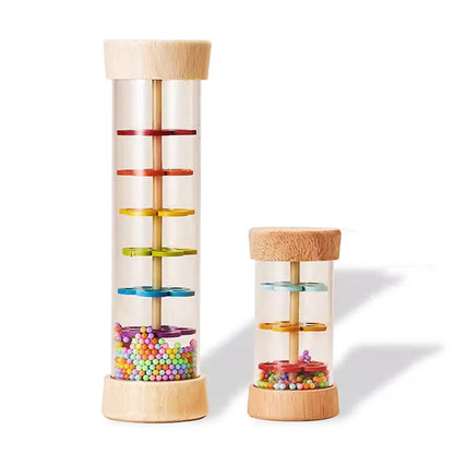 Two wooden hourglass-shaped containers with colorful beads on a white background