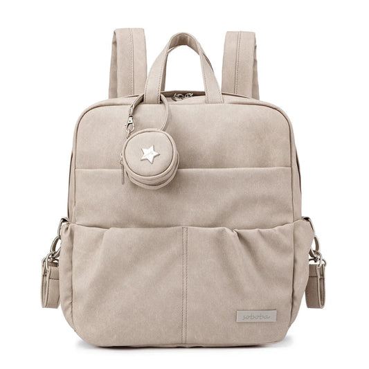 Beige backpack with a star emblem on a white background