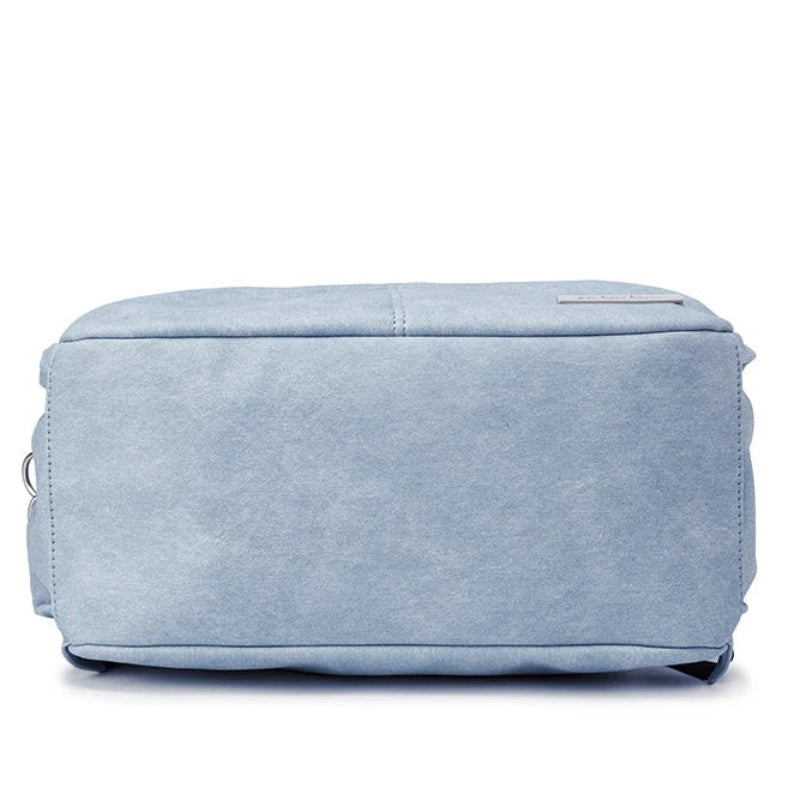 Light blue fabric ottoman on a white background