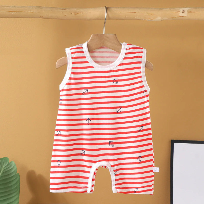 Red and white striped baby romper with small patterns on a hanger against a beige wall.