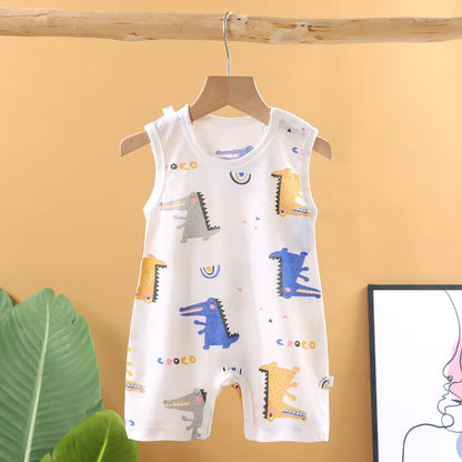 Children's sleeveless romper with dinosaur pattern on a hanger against a yellow wall.