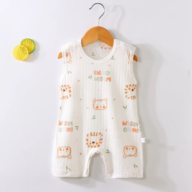 Baby romper with animal prints on a hanger against a light background