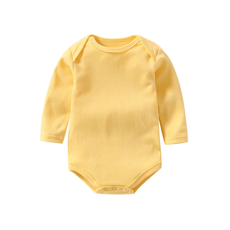 Yellow baby bodysuit with long sleeves on a white background
