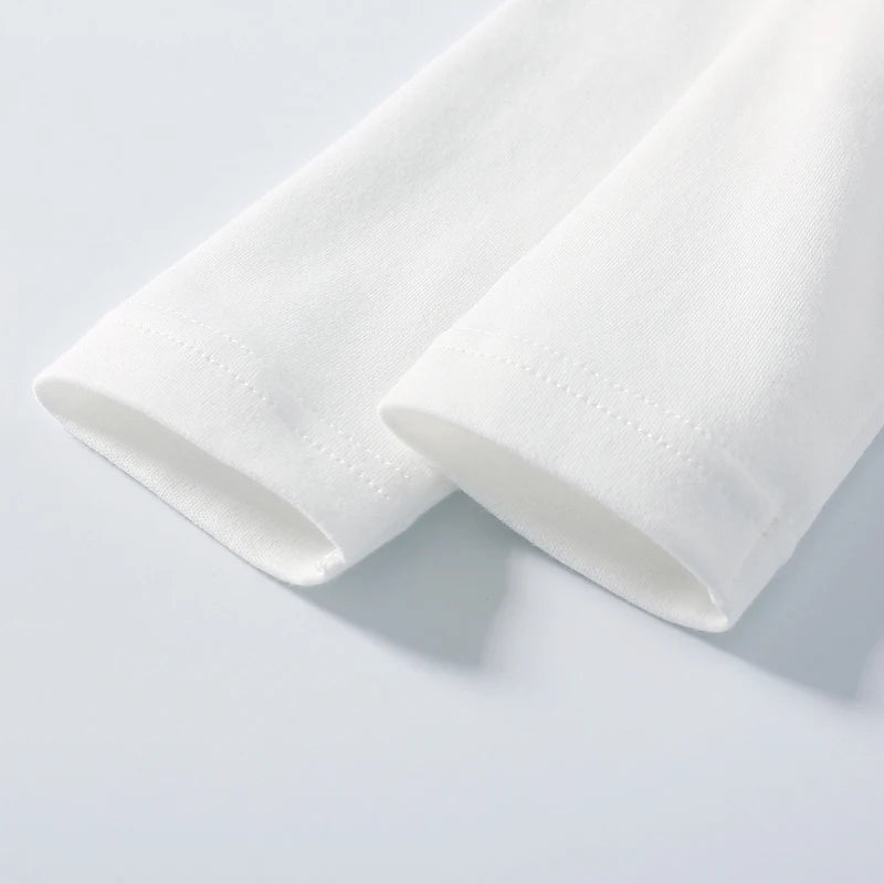 Two white ceramic bowls on a light gray background