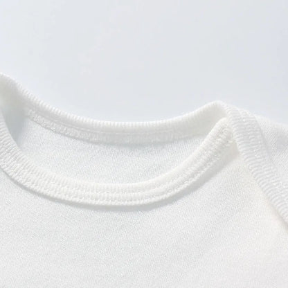 Close-up of a white sweater collar on a light gray background