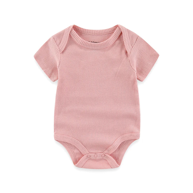 Pink baby bodysuit on a white background