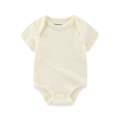 Yellow baby onesie on a white background