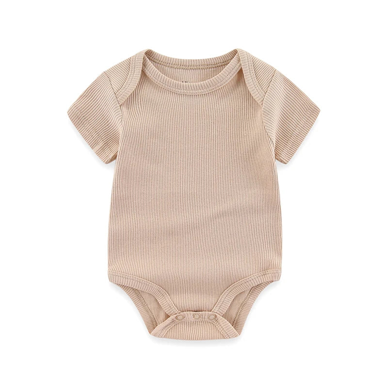 Beige baby bodysuit on a white background