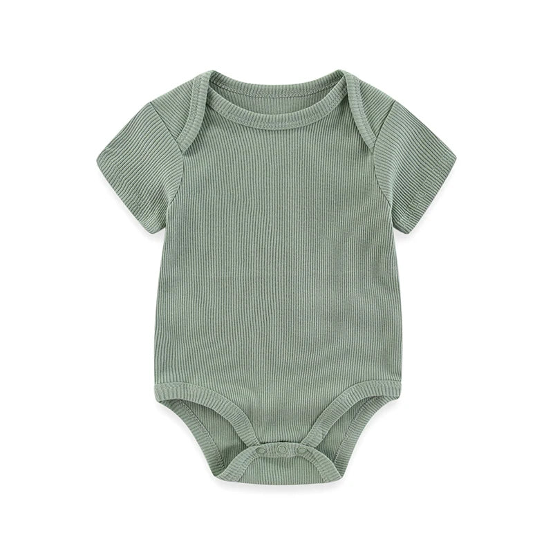 Green baby bodysuit with short sleeves on a white background