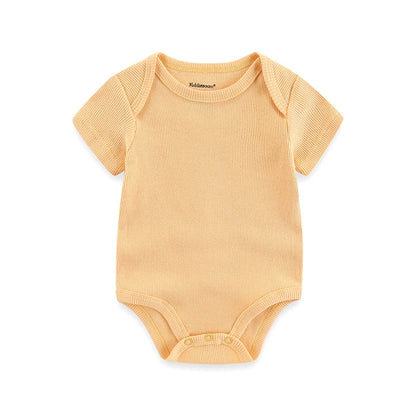 Yellow baby onesie on a white background