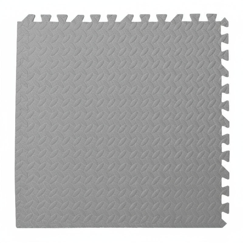 Gray interlocking foam mat with textured pattern on a white background