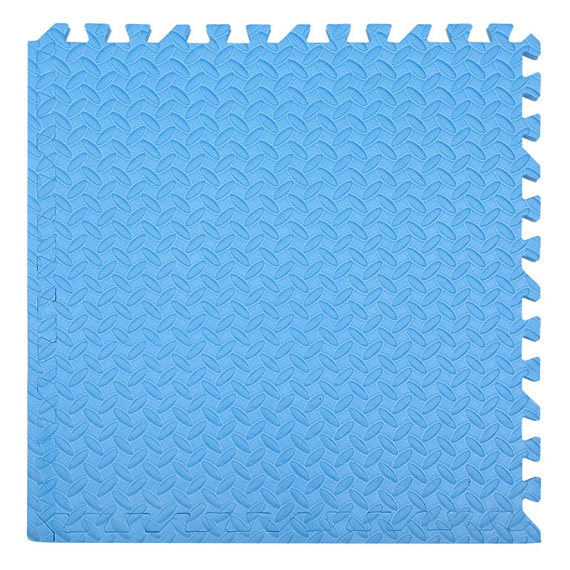 Blue foam puzzle mat with textured surface