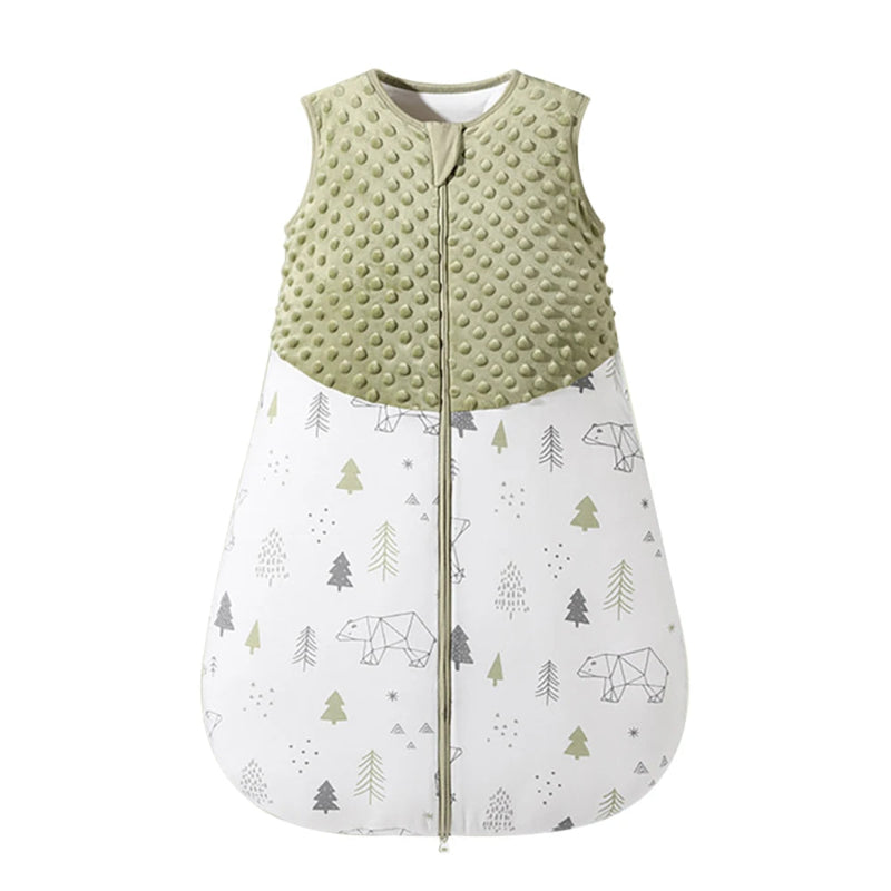Baby sleeping bag with green textured top and forest patterned bottom on a white background