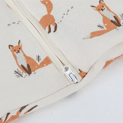 Fabric with fox pattern and zipper on a white background