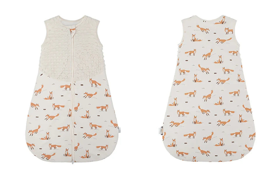 Two baby sleeping bags with fox pattern on a white background